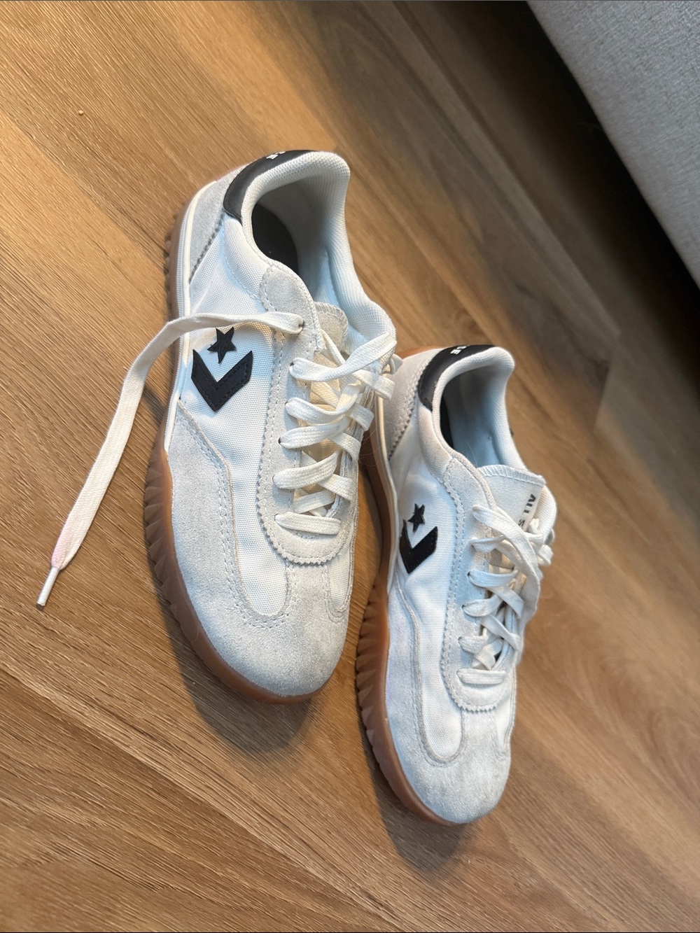 Converse White Low-Top Sneakers with Black Chevron Star and Gum Sole